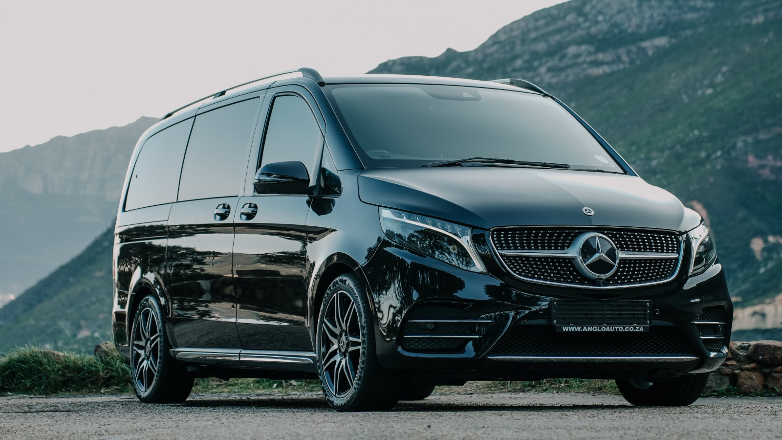 Black Mercedes-Benz V-Class photographed against a Cape Town mountain backdrop