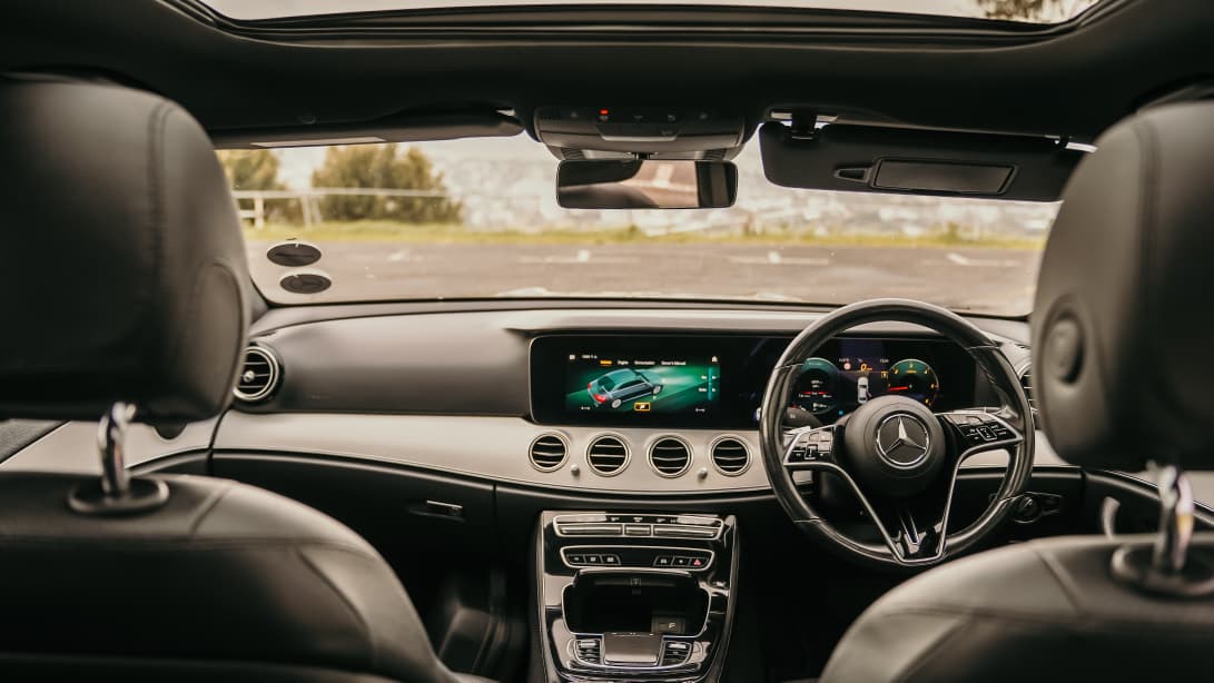 Mercedes-Benz E-Class cabin with panoramic roof and dashboard