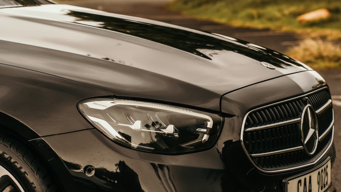 Mercedes-Benz E-Class headlight and grille detail